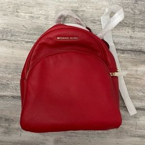 NWT Micheal Kors Red Leather backpack.
